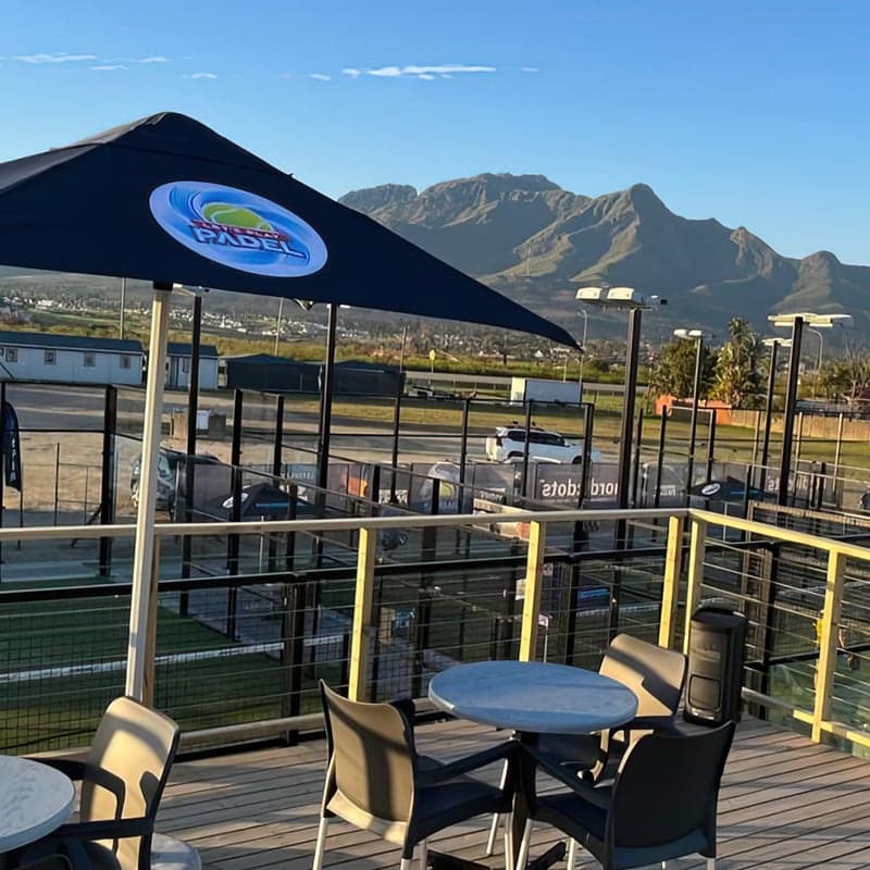 Let's Play Padel logo applied to club umbrella – outdoor brand application