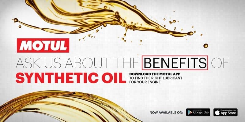 Motul Kyalami raceway billboard with golden oil splash and synthetic oil messaging