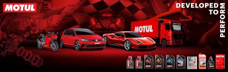 Motul Midas Performance panoramic workshop wall banner with vehicles, products, and motorsport imagery