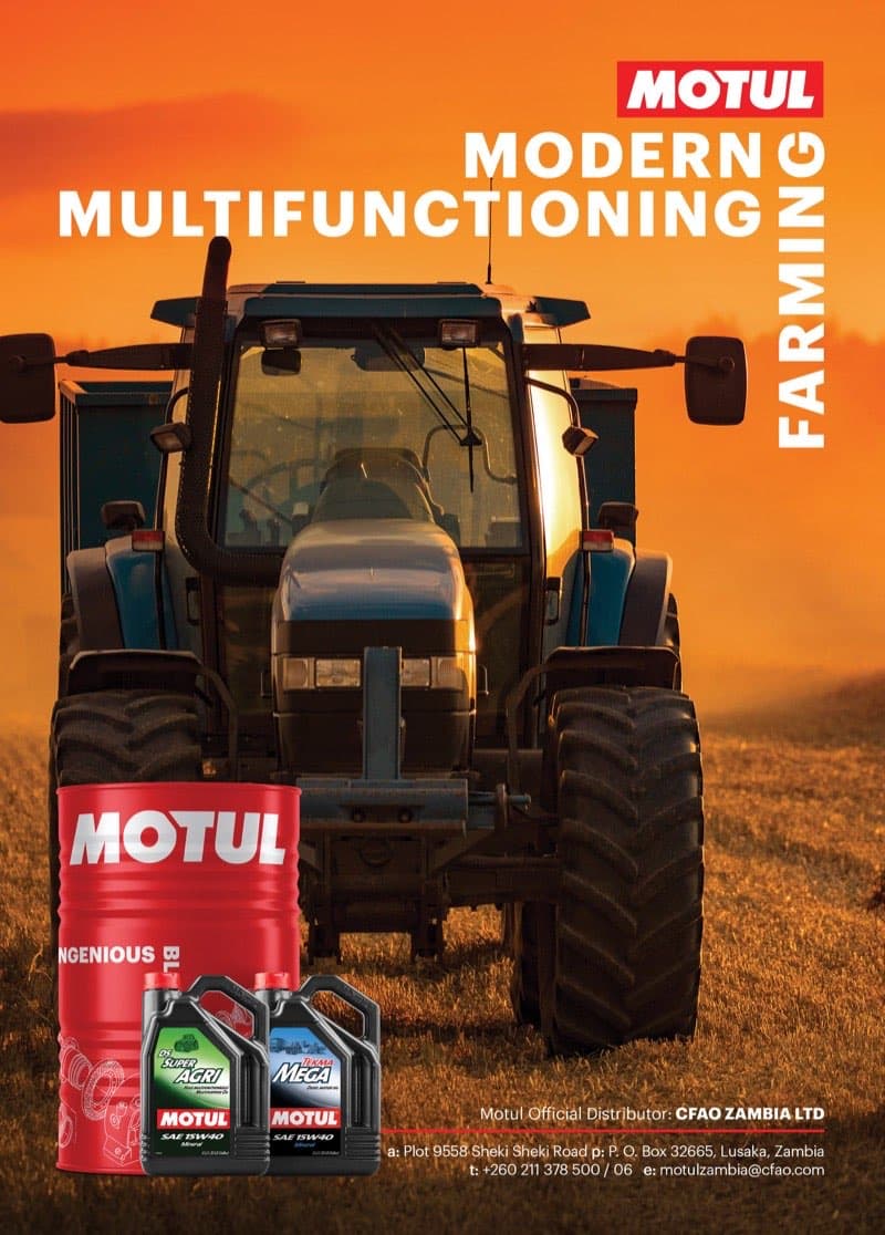 Motul Zambia agricultural magazine advert with tractor in golden farmland at sunset